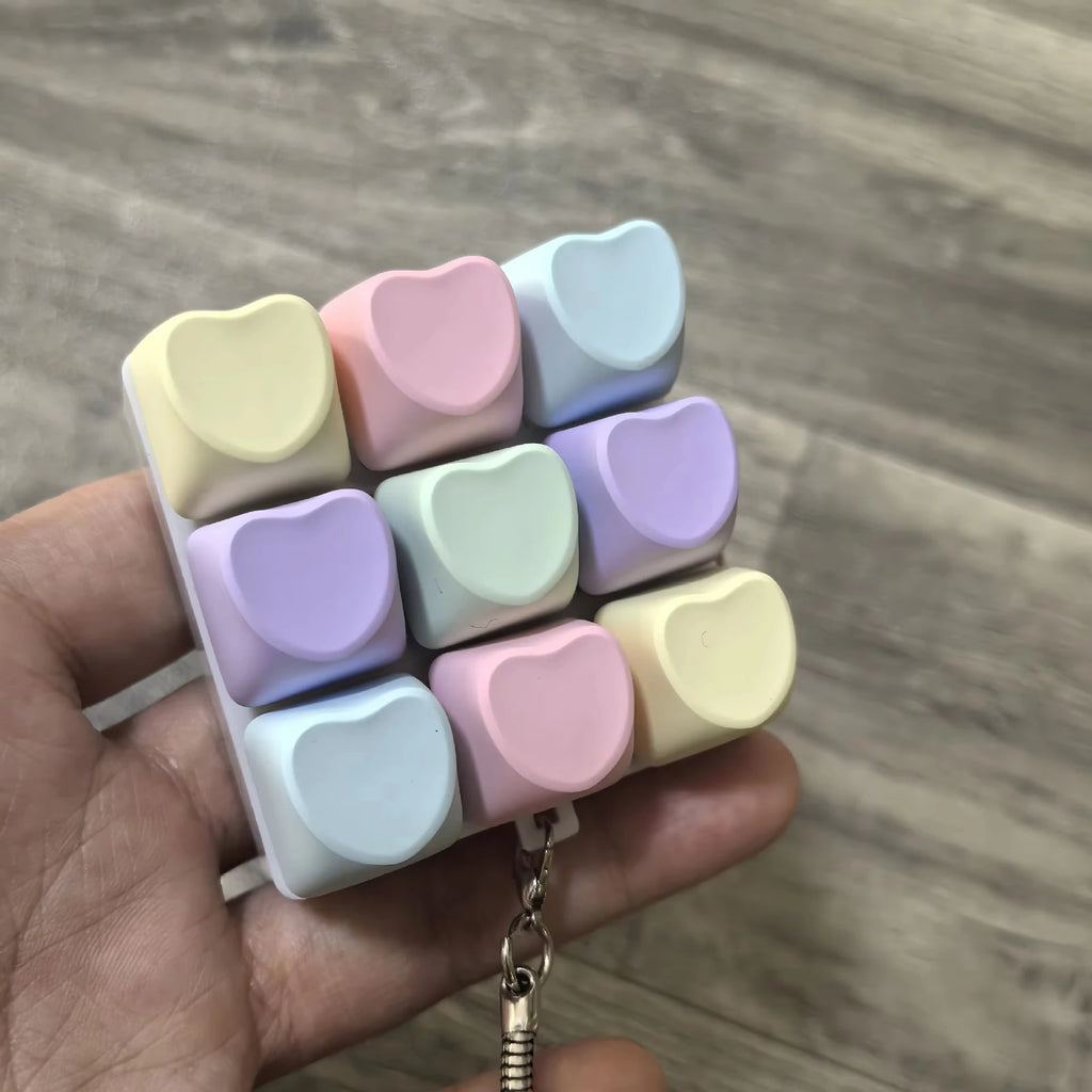 Heart-shaped 9 Keyboard Key Clicker Toy Anti Stress Relief Finger Keychain Game Button Pinch Tester Without Light